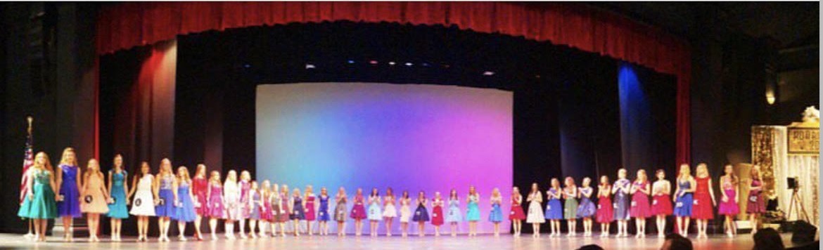 Distinguished Young Women from the Mini-Cassia area line up on stage